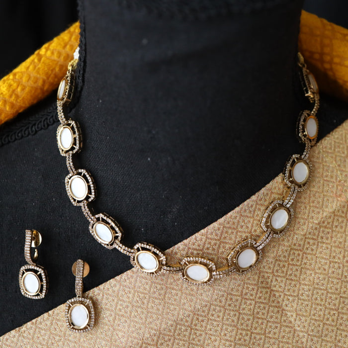 Trendy mother of pearl short necklace with earrings and tikka TW98
