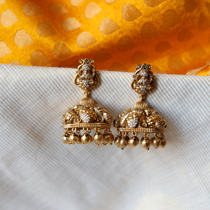 Antique white stone temple jumka earrings AJ481