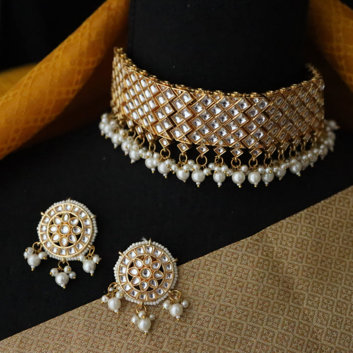 Heera white Kundan stone and pearls choker with earrings and tikka 17632214