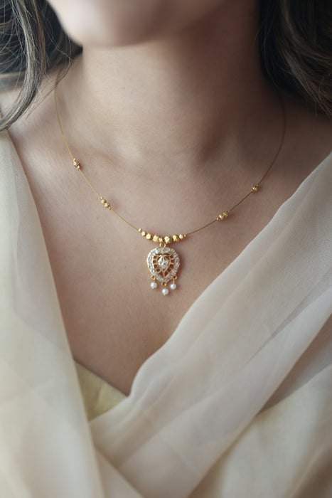 Heritage gold plated invisible necklace IN1132