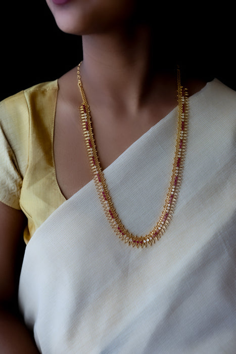 Heritage gold plated ruby white stone long necklace HL5556