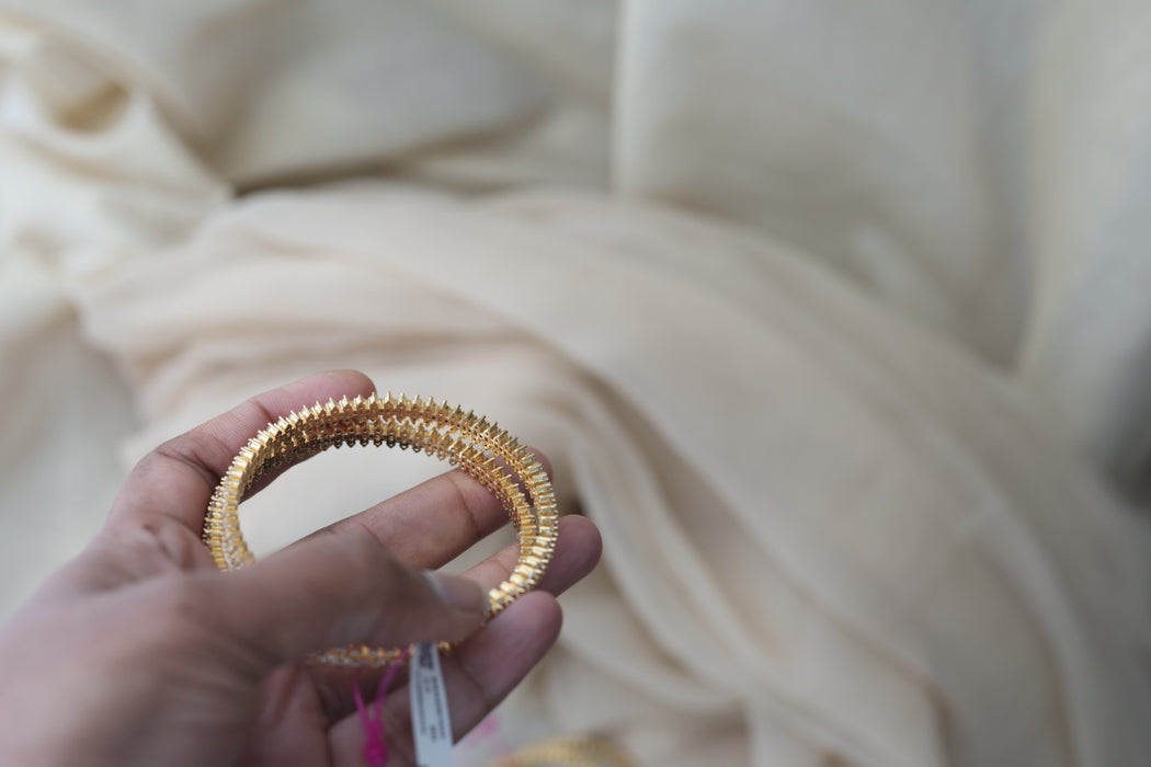 Heritage gold plated white stone bangle HB6527