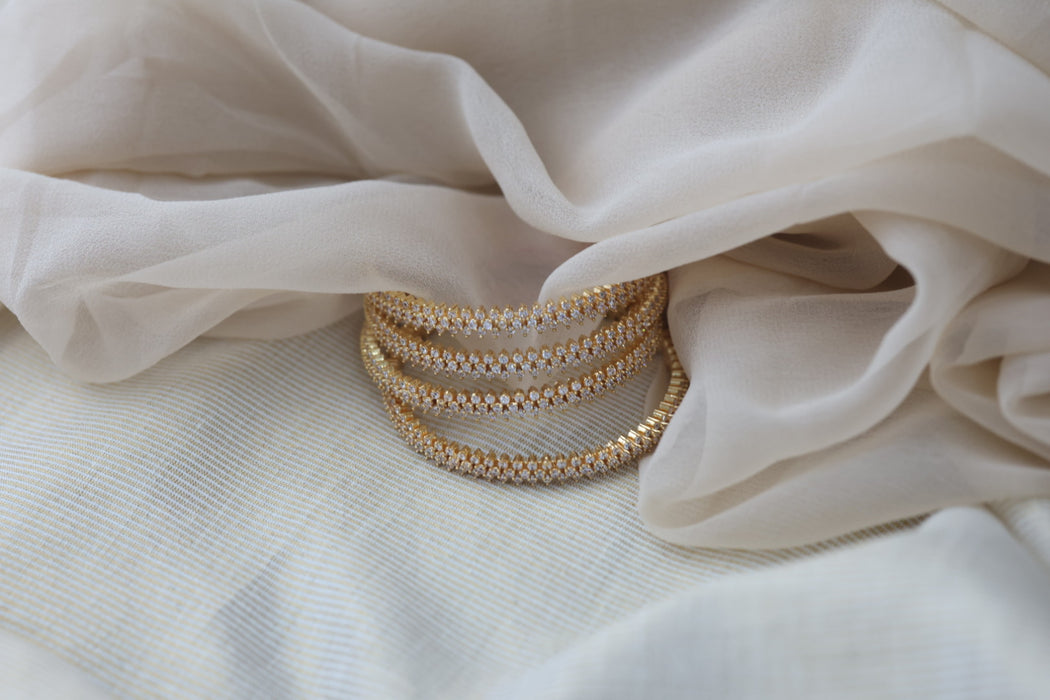 Heritage gold plated white stone bangle HB6527