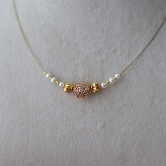 Heritage gold plated white stone invisible necklace IN1334