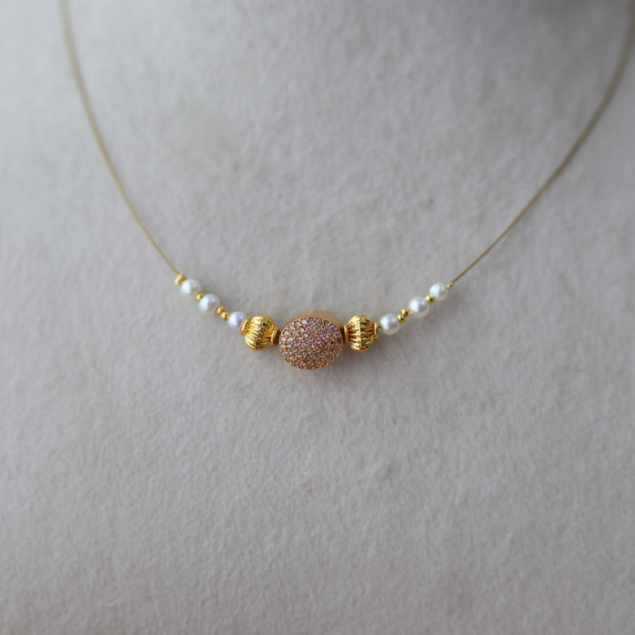 Heritage gold plated white stone invisible necklace IN1334