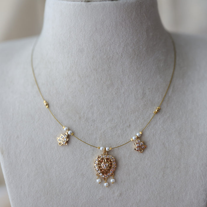 Heritage gold plated white stone  invisible necklace IN22332