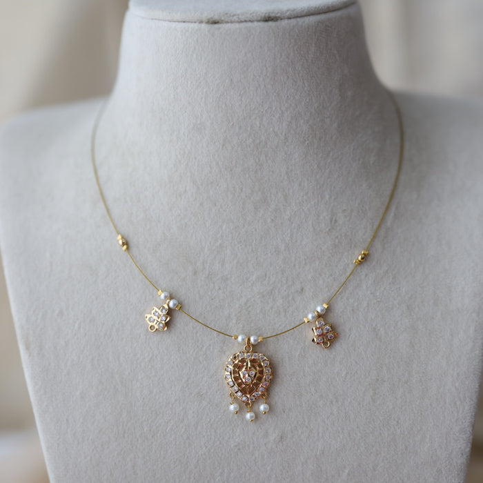 Heritage gold plated white stone  invisible necklace IN22332