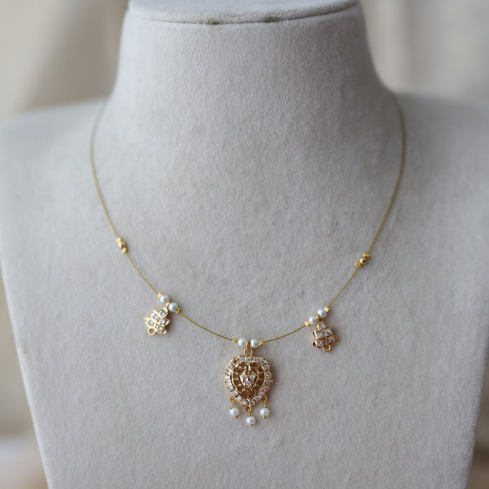 Heritage gold plated white stone  invisible necklace IN22332
