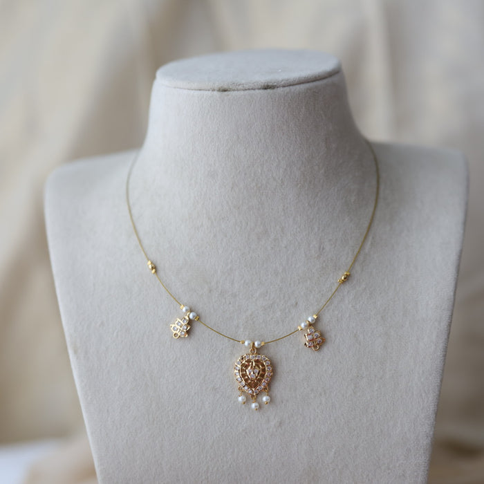 Heritage gold plated white stone  invisible necklace IN22332