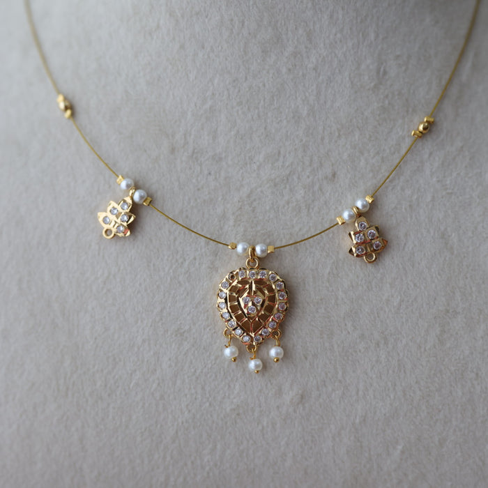 Heritage gold plated white stone  invisible necklace IN22332