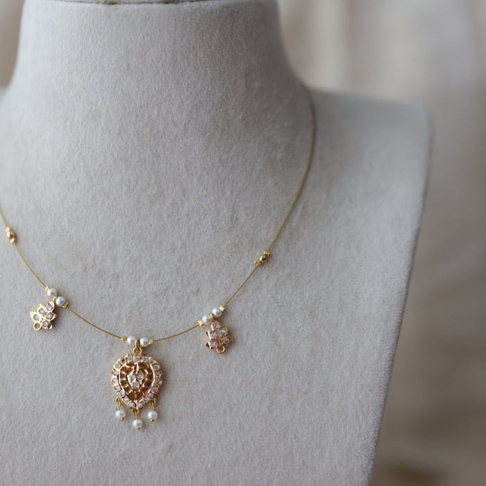 Heritage gold plated white stone  invisible necklace IN22332