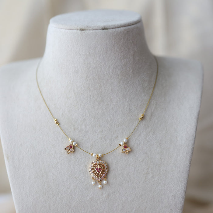 Heritage gold plated ruby white stone invisible necklace IN1344
