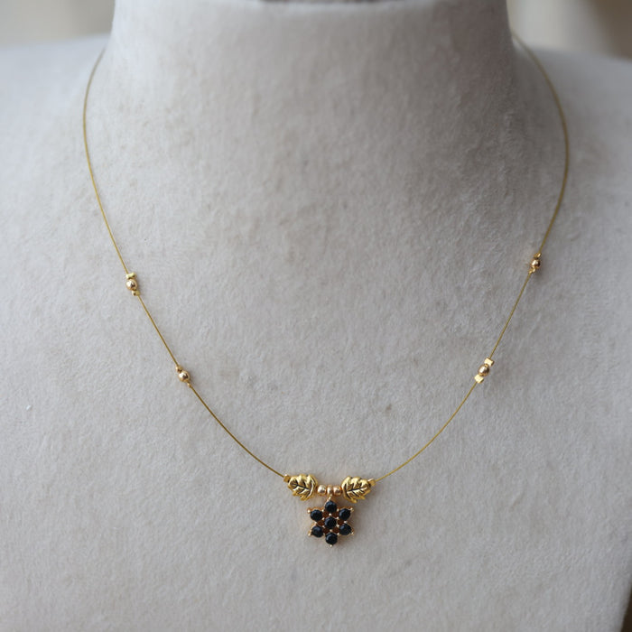 Heritage gold plated black stone invisible necklace IN5997