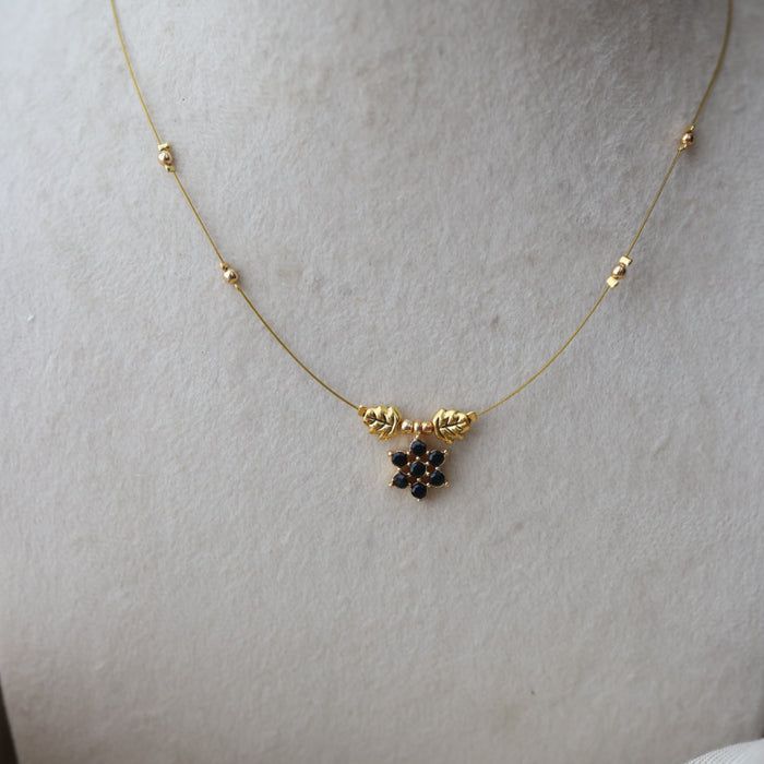 Heritage gold plated black stone invisible necklace IN5997