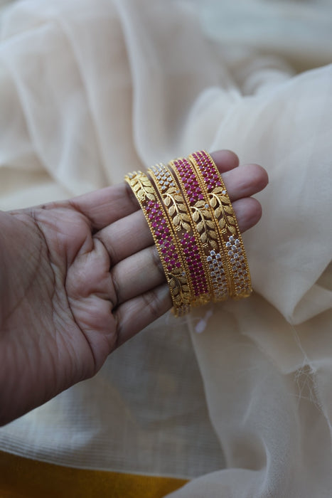 Heritage gold plated white stone bangle HB6963