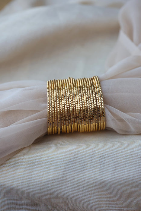 Heritage gold plated white stone bangle HB652133 (Set of 12 bangles)