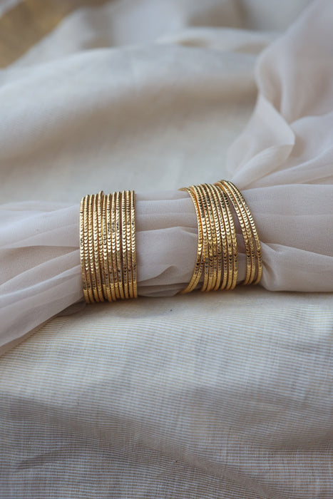 Heritage gold plated white stone bangle HB652133 (Set of 12 bangles)