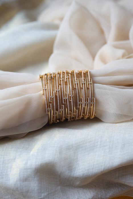 Heritage gold plated white stone bangle HB2446