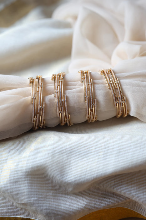 Heritage gold plated white stone bangle HB2446