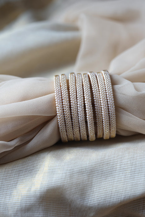 Heritage gold plated white stone bangle HB62566