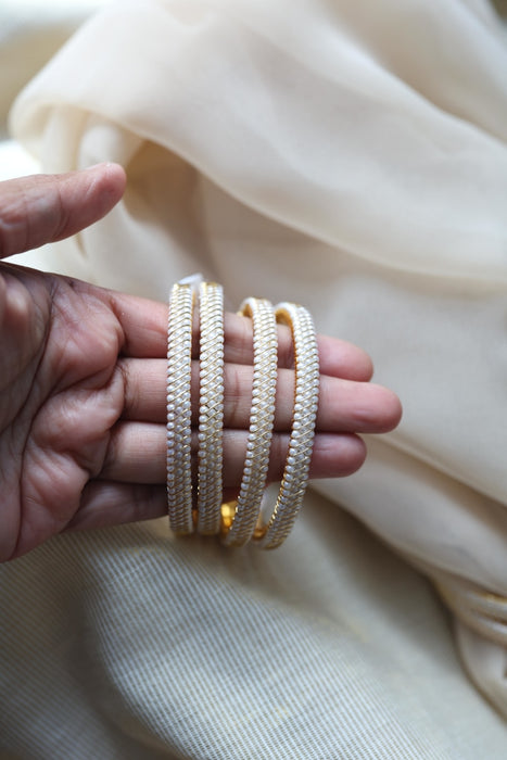Heritage gold plated white stone bangle HB62566