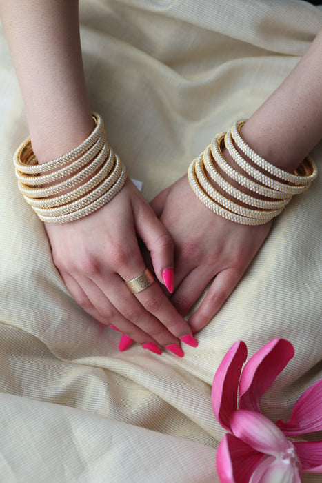 Heritage gold plated white stone bangle HB62566