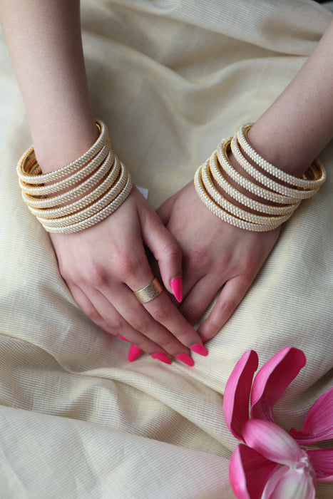Heritage gold plated white stone bangle HB62566