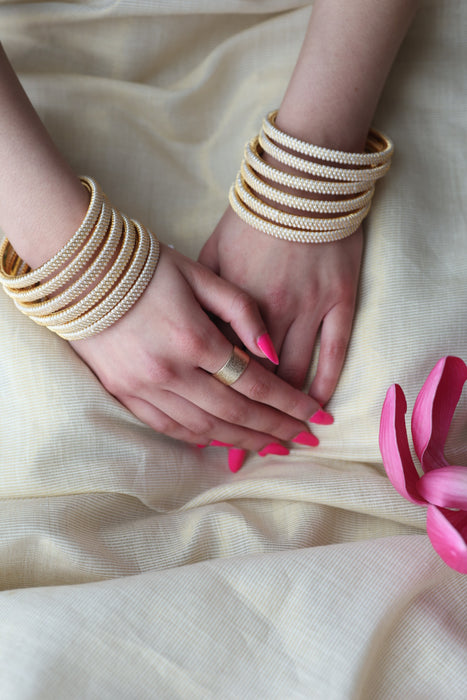 Heritage gold plated white stone bangle HB62566