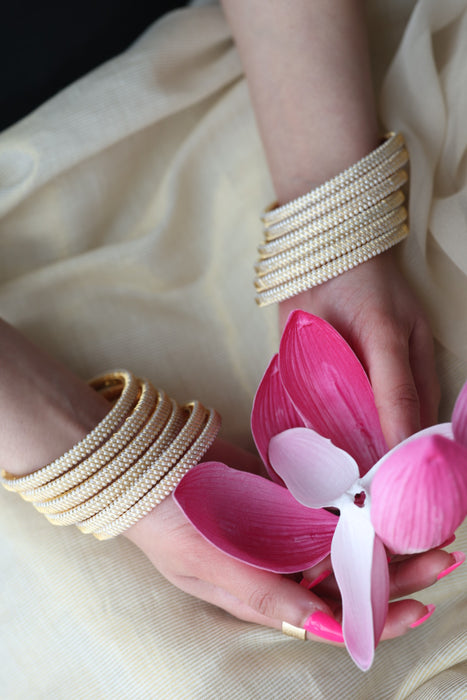 Heritage gold plated white stone bangle HB62566