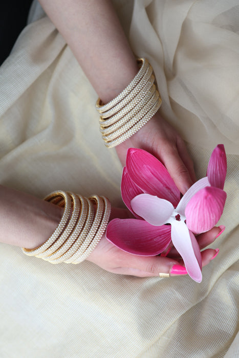 Heritage gold plated white stone bangle HB62566