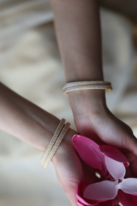 Heritage gold plated white stone bangle HB62566