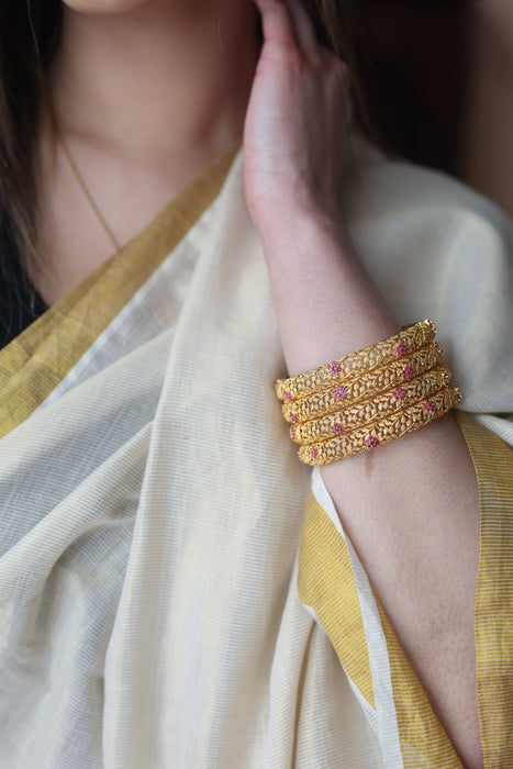 Heritage gold plated white stone bangle HB445