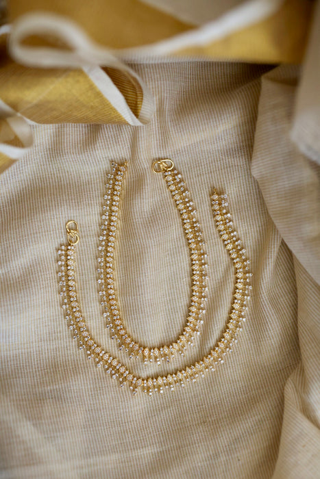Heritage gold white stone traditional payal HAN12165