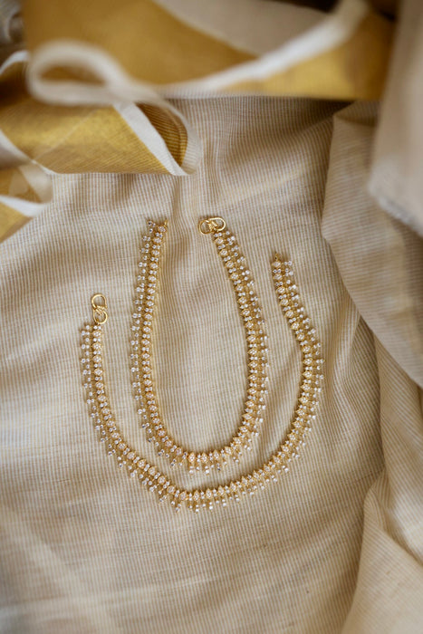 Heritage gold white stone traditional payal HAN12165