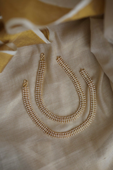 Heritage gold white stone traditional payal HAN12134