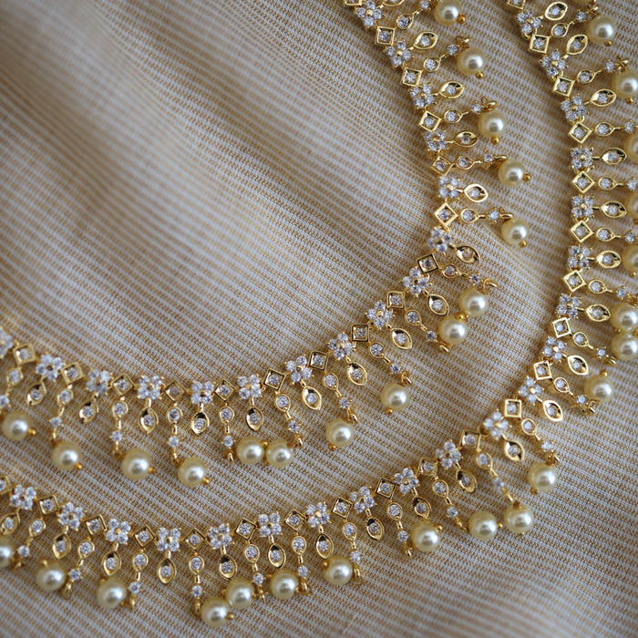 Heritage gold white stone and pearl traditional payal AN12155