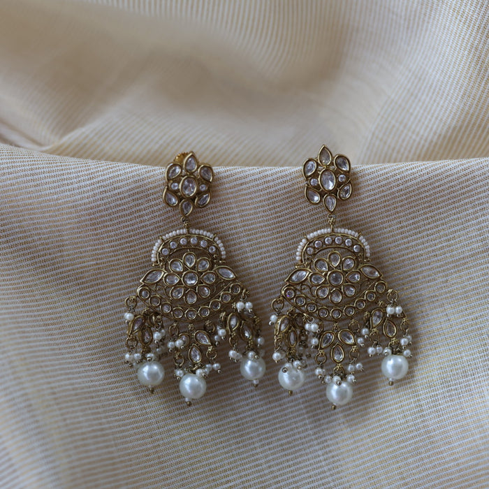 Trendy white stone drop earrings and tikka TJ6822