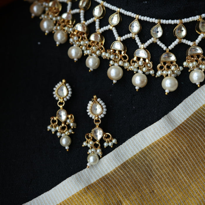 Invisible chain kundan stone short necklace with earrings IN110