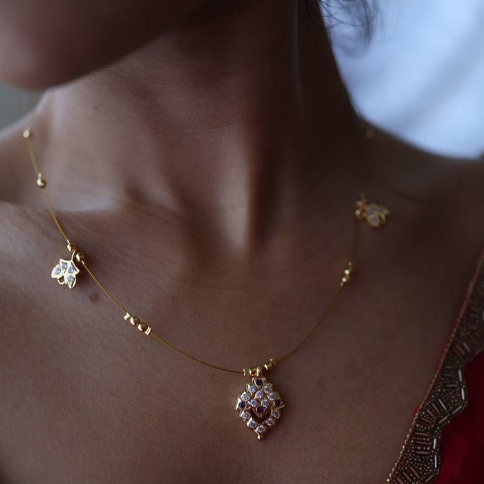 Heritage gold plated ruby white invisible short necklace IN903