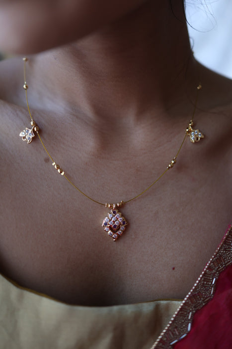 Heritage gold plated ruby white invisible short necklace IN903