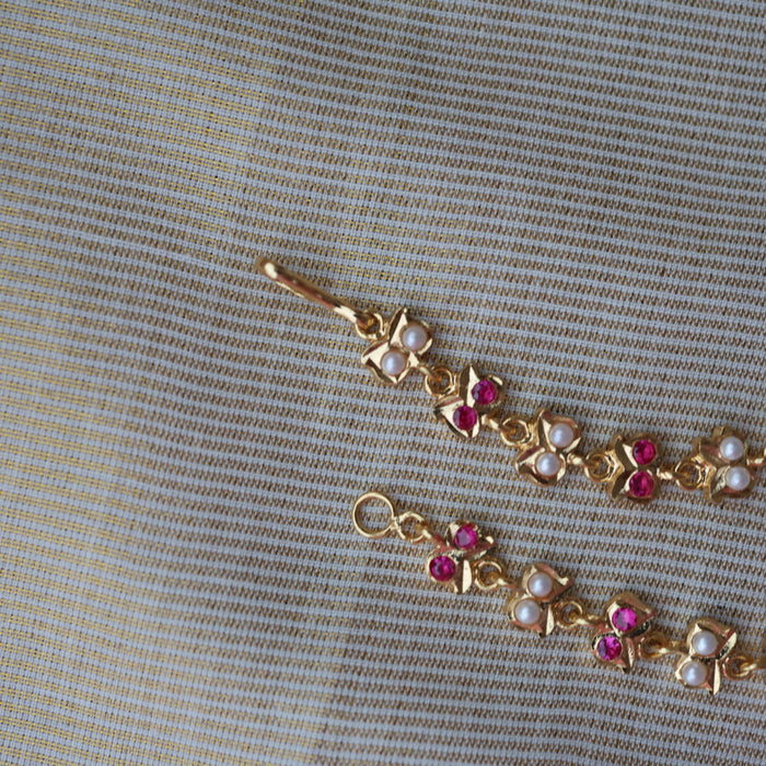 Heritage ruby white stone gold and pearl mattal ear accessories HM7659