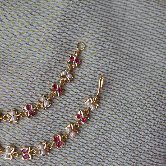 Heritage ruby white stone gold and pearl mattal ear accessories HM7659