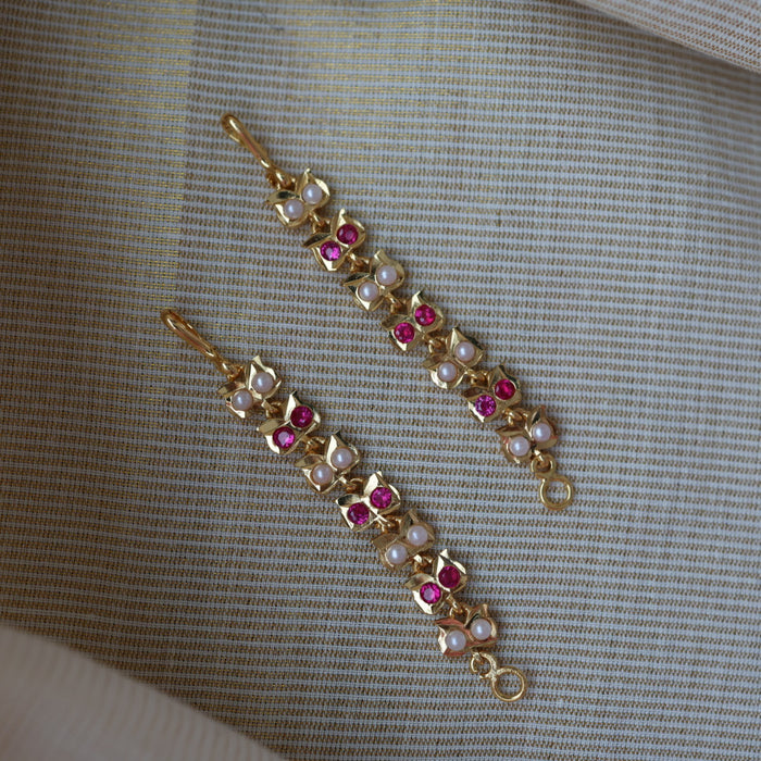 Heritage ruby white stone gold and pearl mattal ear accessories HM7908