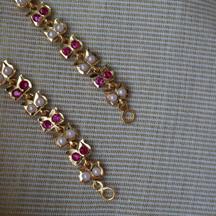 Heritage ruby white stone gold and pearl mattal ear accessories HM7908