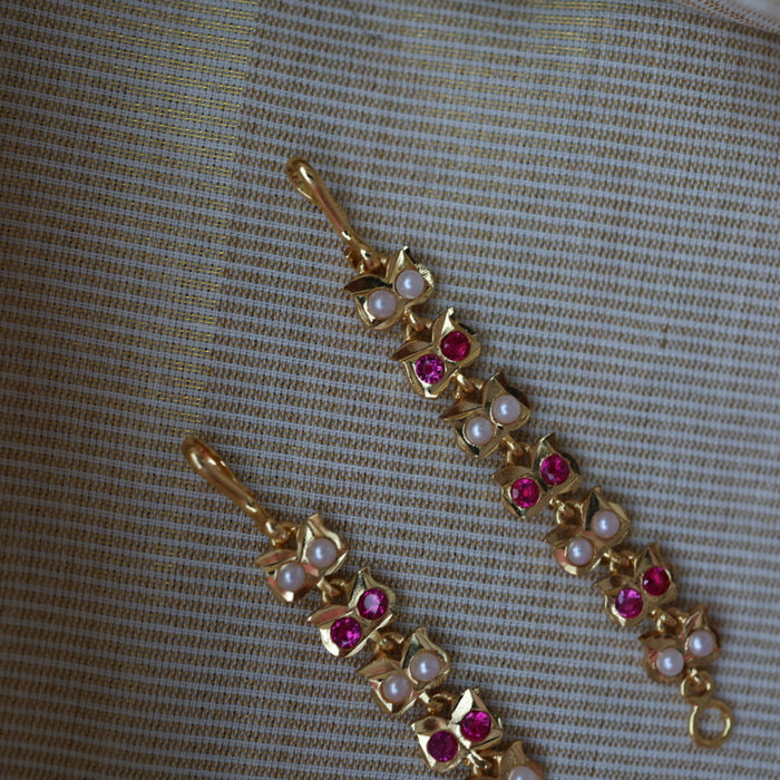Heritage ruby white stone gold and pearl mattal ear accessories HM7908