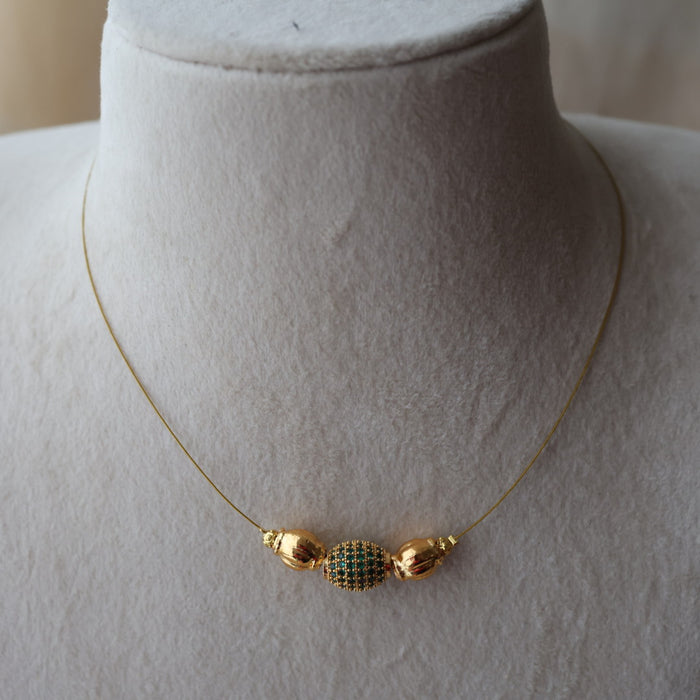 Heritage gold plated green stone invisible short necklace IN905