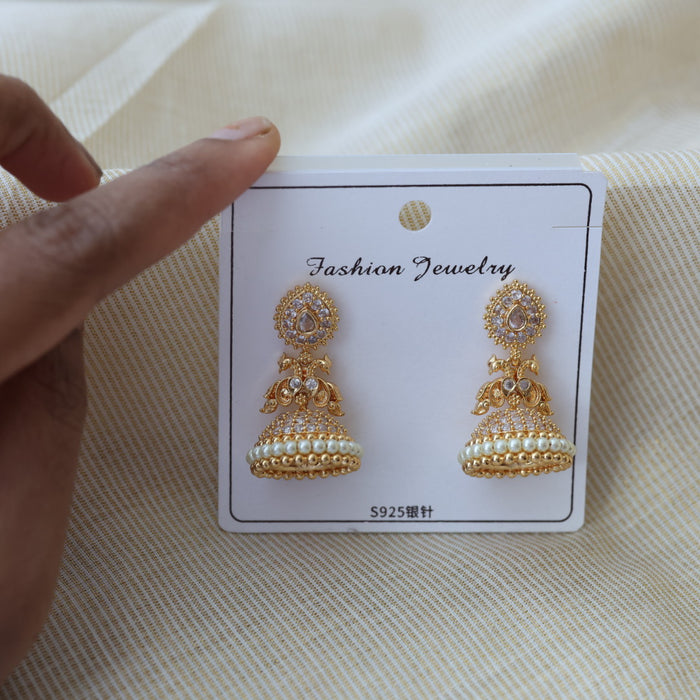 Heritage gold plated white stone jumka earrings HJ46677