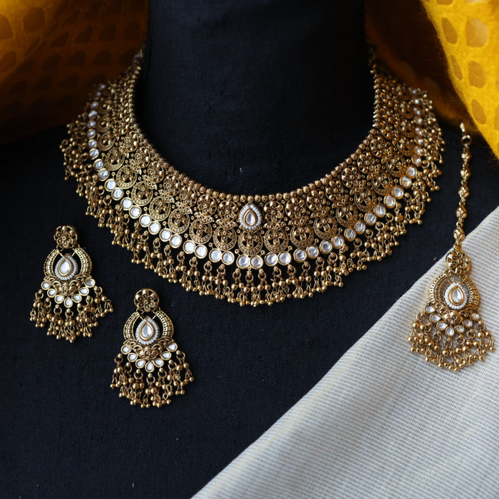 Antique gold choker necklace with earrings and tikka G3111