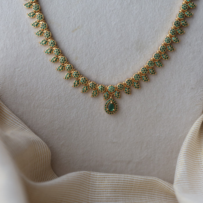 Heritage gold plated green stone mango long necklace with earrings  HLS8023
