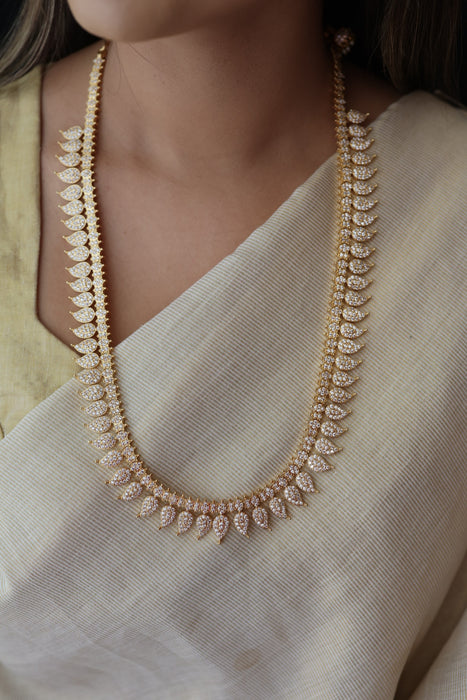 Heritage gold plated white stone mango long necklace HL78923